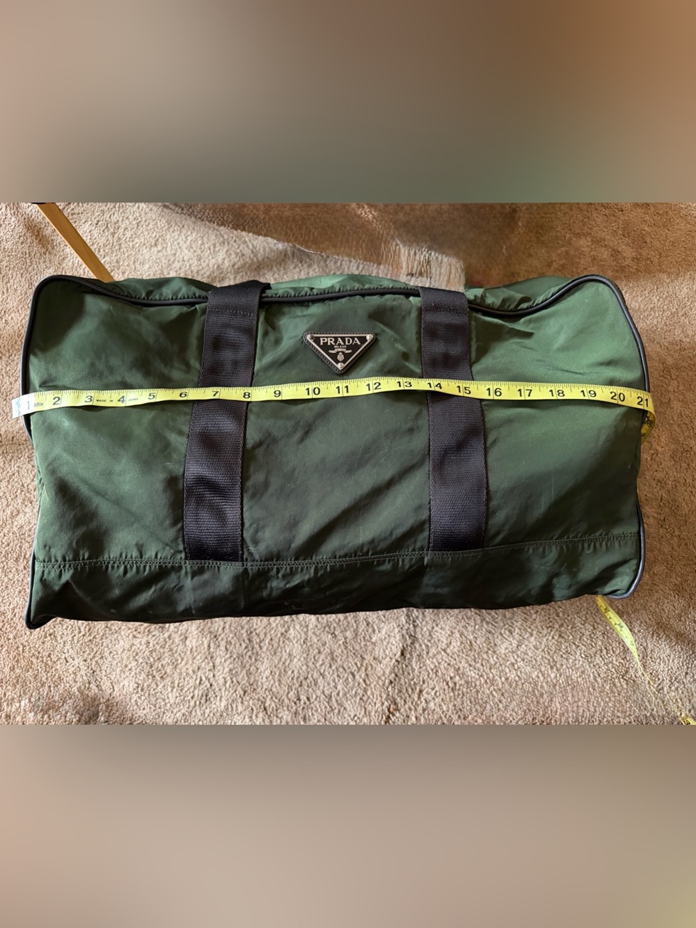 Prada Olive Green Nylon Duffel Bag with Black Straps.